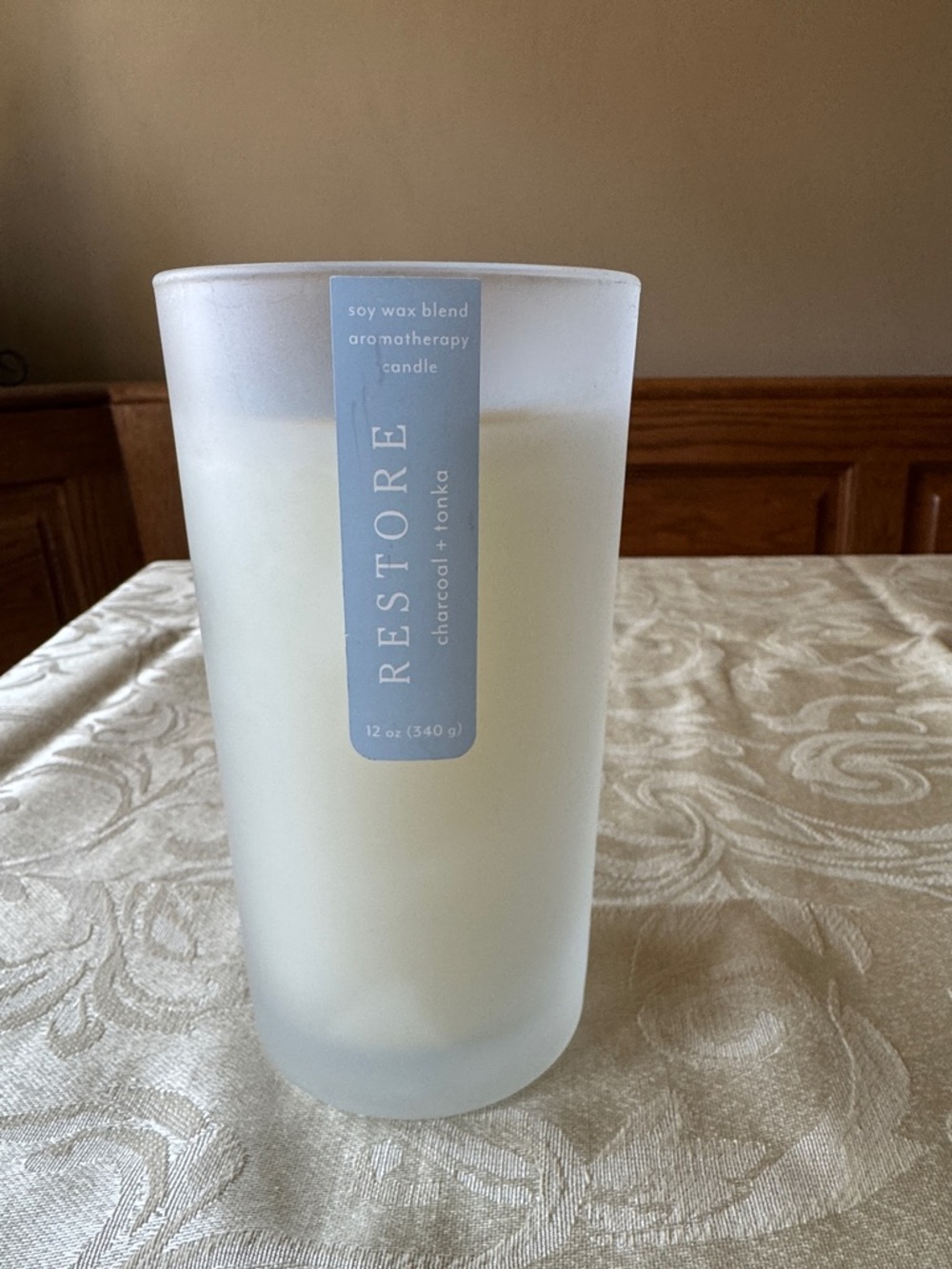 Neiman Marcus Restore Aromatherapy Candle in Frosted White with Light Blue Label